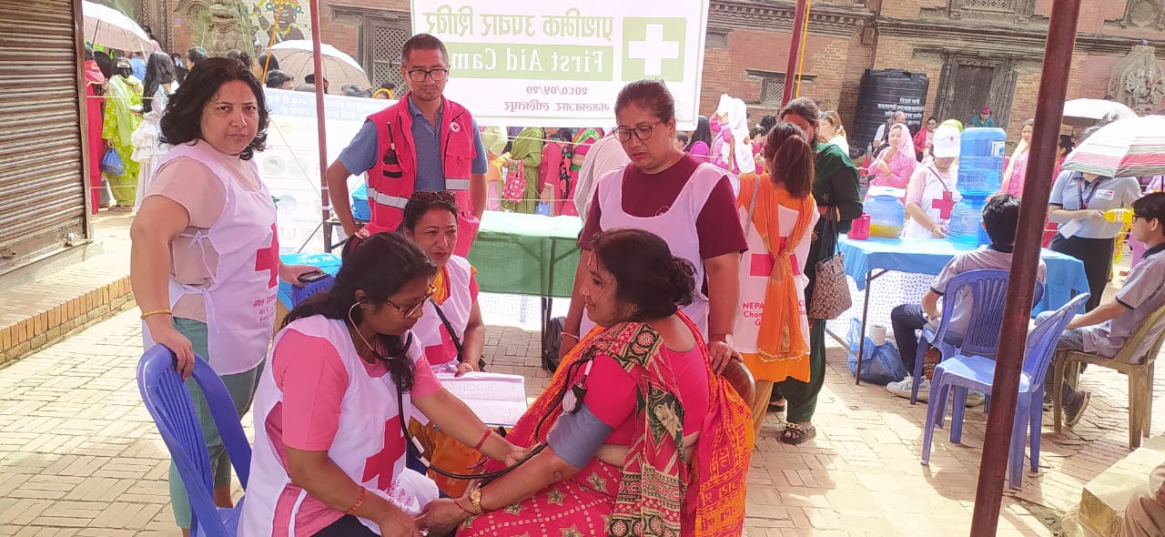 A patient getting their blood pressure measured.